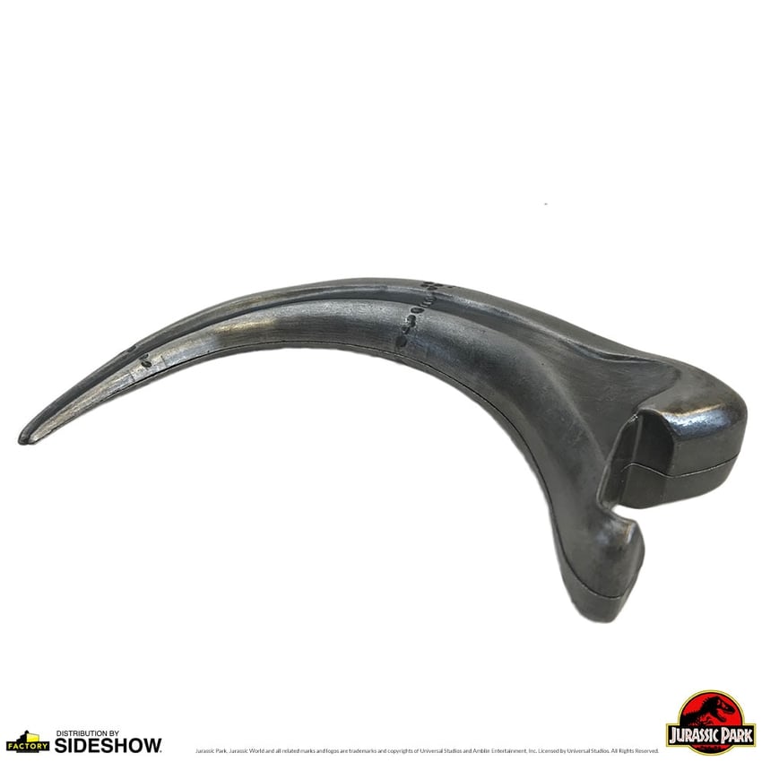 11667-fossil-raptor-claw-metal-bottle-opener-1.jpg